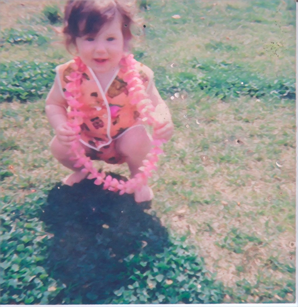 digitally edited photo of the author playing on the grass